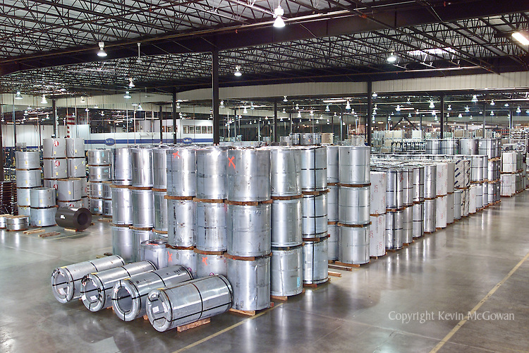 Sheet metal rolls at metal fabrication factory